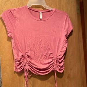 pink crop top with pulls